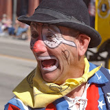 Cody Nite Rodeo clown Butch Lehmkuhler makes faces at kids.