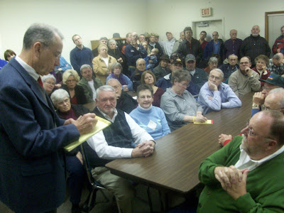U.S. Senator Chuck Grassley (R-New Hartford) jots down notes from one of the hundreds in attendance at the town hall meeting in Kalona (1/13/10) - KCII NEWS U.S. Senator Chuck Grassley (R-New Hartford) jots down notes from one of the hundreds in attendance at the town hall meeting in Kalona (1/13/10) - KCII NEWS
