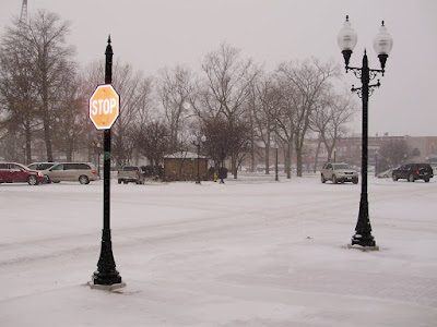 The camera flash lights up a new stop sign downtown. December 16, 2008. Washington, Iowa. (Ben Stanton/KCII)