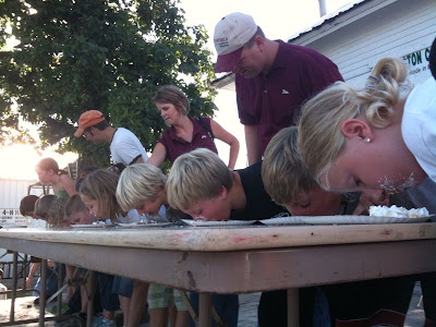 Kids Participating In The Washington County Fair Pie Eating Contest. Kids Participating In The Washington County Fair Pie Eating Contest.