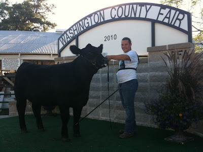 Joni Erwin Posing For Photos After A Win At This Year's Washington County Fair.  Erwin Will Show Cattle This Weekend And Early Next Week At The Iowa State Fair.<br />
(KCII's Chance Dorland)