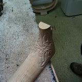 The neck for another guitar.  This is mirrored carving, so one side is a mirror-image of the other.  Painstaking detail.