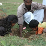 Ramesh ji planting with kids