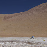 Wide open space on the altiplano as the moon rises over the mountain