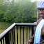 Keyon braves the rain on the Elmwood Avenue bridge across the Genesee