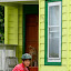 Juan in front of his house.