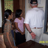 Nargis donor, Montana attorney Warren Little and volunteer librarians in Mawlmyaine library