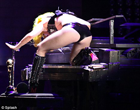 article 1280441 09B3572F000005DC 313 468x369 Lady Gaga performs in more Madonna inspired costumes
