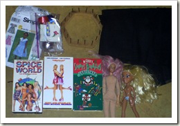 Rummage sale haul, crafts supplies, dolls and videos.