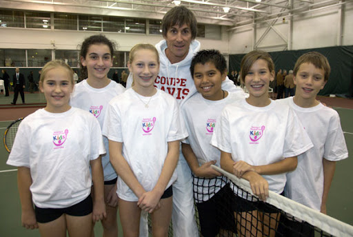 Davis Cup Coach and Captain Martin Laurendeau with Tennis Manitoba juniors