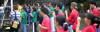 Students follow the oath.