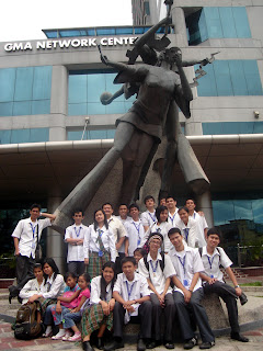 March 12: Students pose behind the GMA Network Center statue and 17-storey building.