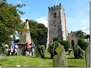 Standing by Henry Jemkins's memorial in the church grounds