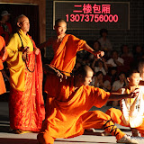 posing for pictures with monks