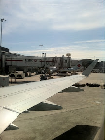 an airplane wing in an airport