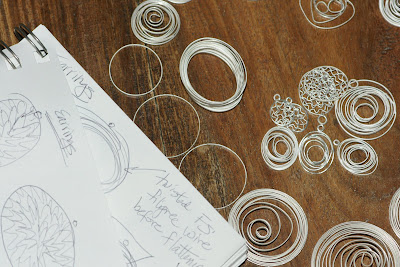 Earrings sketches made on the beach with recycled sterling silver pieces in process