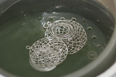 Reflections and Swirling Schools recycled sterling silver jewelry heading into the ultrasonic bath