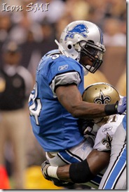 2009 September 13: Detroit Lions running back Kevin Smith (34) is hit by New Orleans Saints linebacker Jonathan Vilma (51) during a 45-27 win by the New Orleans Saints over the Detroit Lions at the Louisiana Superdome in New Orleans, Louisiana.