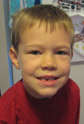 BigE smile after losing his first tooth