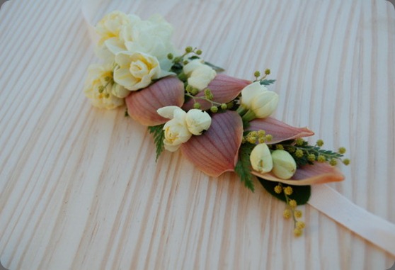 headbands sewn of cymbidium orchid petals, acacia, narcissus, rabbit foot fern, and daphne blossoms the monkey flower group