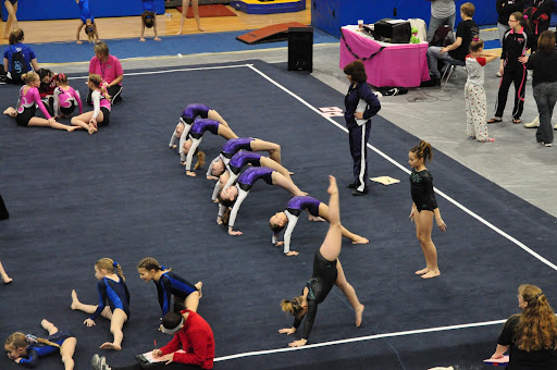 Level 4 team stretches for the meet