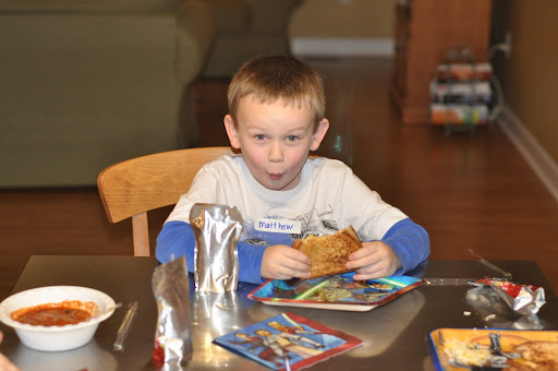 Mathew chomps a grilled cheese