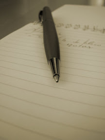 Bloco de Notas e Caneta