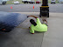 Inspector checking the height of the car in the front