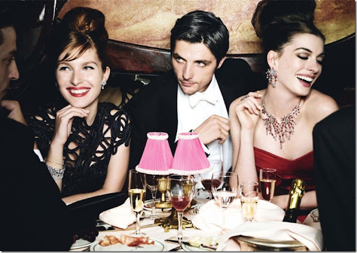 The actress, with Raphaël Personnaz and Josephine de la Baume at Maxim's.