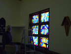 Frank Thompson and the east side stained glass windows.