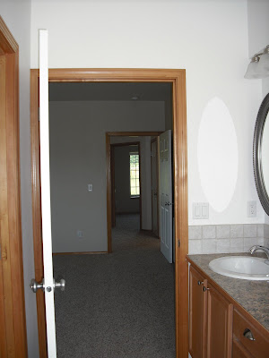 Looking from Master Bath out to Master Bedroom and Hallway