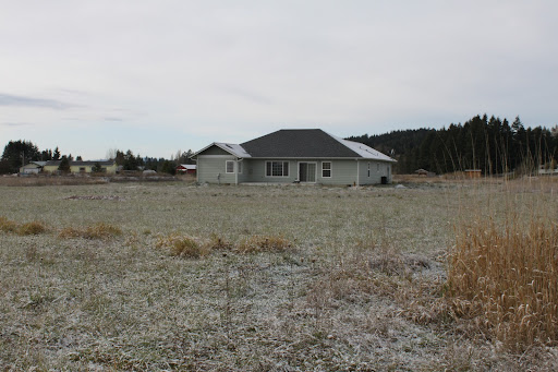 The back of the house, looking from the back corner of our property