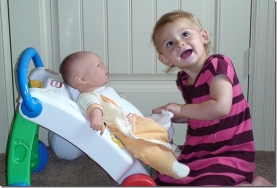tess checking doll's diaper