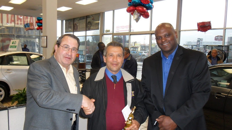 Ben Shabesteri (center) is awarded Sales Associate of the Month for Jan 2010