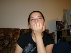 Kendra trying not to look at the camera