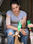 Better shot of Kendra feeding the baby goat