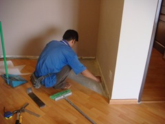 Replacing damaged laminated floor panels in the master bedroom