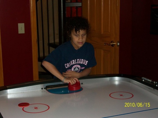 [Sydney playing Air Hockey[2].jpg]
