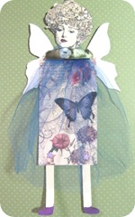 art decoupaged paper doll