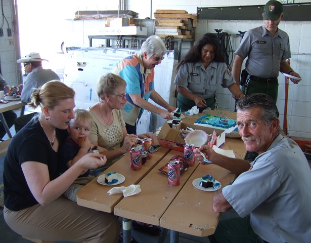[ed_larry and family eating cake at his retirement_092702[11].jpg]
