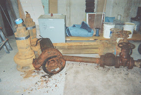 Removed sections of the old, corroded cast iron pipe. 