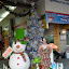 Lynette admiring the local decorations, particularly amusing when 99.99% of the locals certainly haven't actually seen a snowman in the, erm, snow.