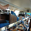 Sleeper bus!  As you can see on the top left, Steve's a little too long for the beds so his feet sit above the little foot pocket!