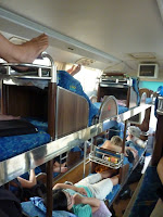 Sleeper bus!  As you can see on the top left, Steve's a little too long for the beds so his feet sit above the little foot pocket!