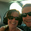 Our grinning faces in the back of the plane.