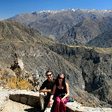 Beaming smiles, a hot shower is just around the corner, with the layered vista of Colca Canyon behind.