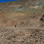 Our guide setting off to a suitably safe distance to blow something up for the sake of it.