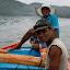 Our fishing hosts setting sail.