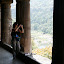 Lynette leaning in from the second storey of one of the impressive caves with her rather excellent new camera.