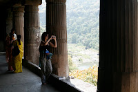 Lynette leaning in from the second storey of one of the impressive caves with her rather excellent new camera.